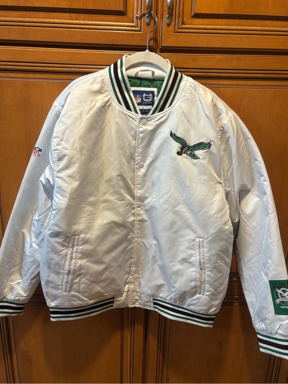 NFL Philadelphia Eagles quilted lining Bomber Jacket. Size: L